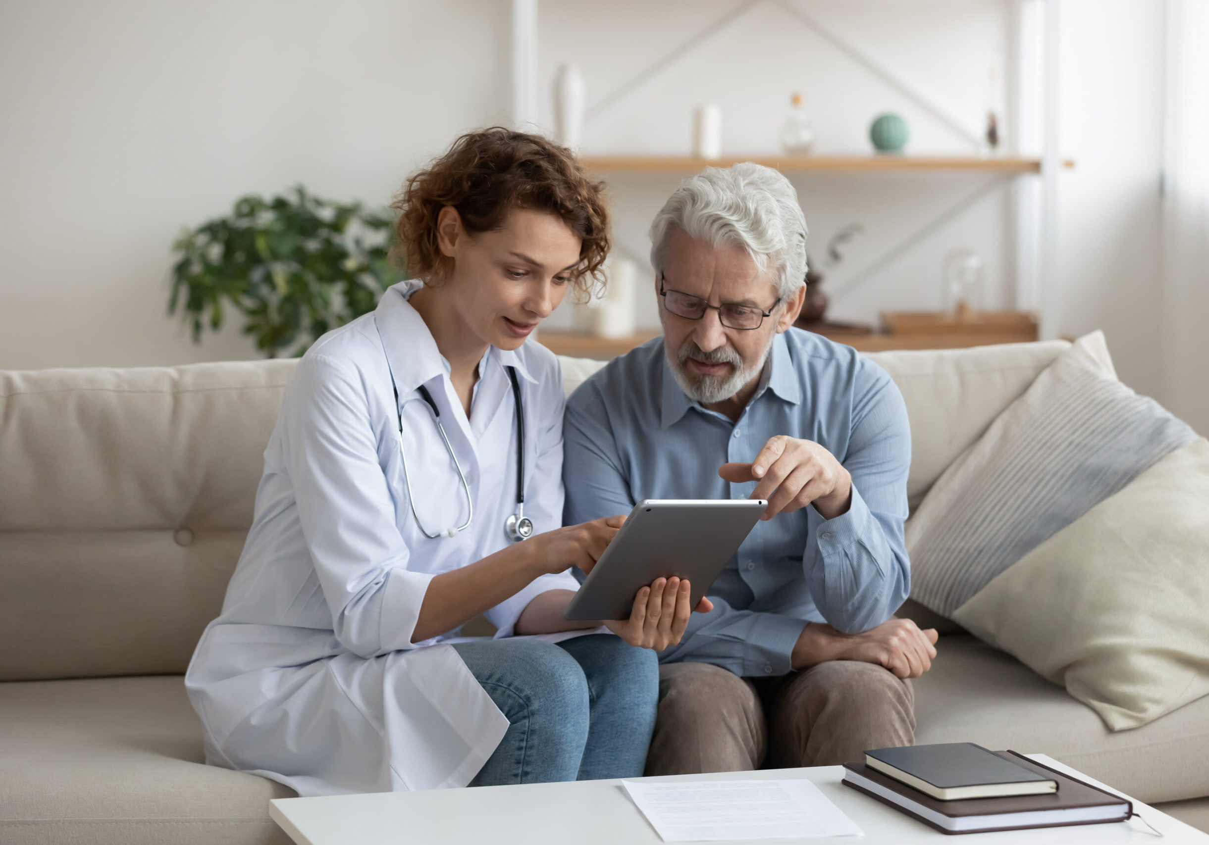 Female,Professional,Doctor,Showing,Medical,Test,Result,Explaining,Prescription,Using